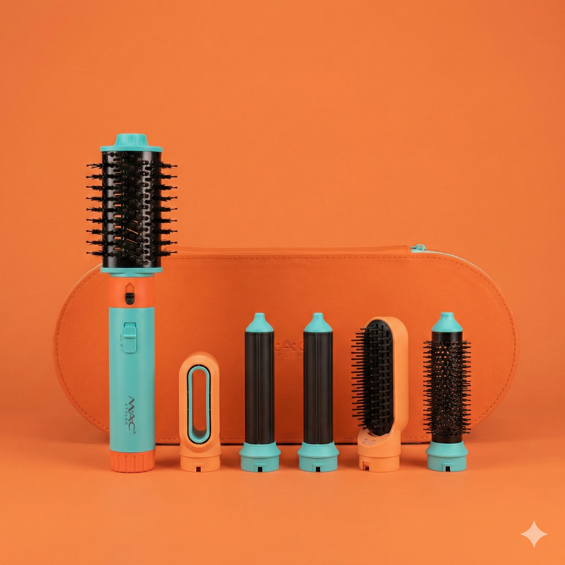 A teal and orange MAC Styler multi-functional hair styling set with six interchangeable attachments and an orange storage case against an orange background.

مجموعة أدوات تصفيف الشعر متعددة الوظائف من ماك ستايلر باللونين الأزرق المخضر والبرتقالي، تتضمن ستة ملحقات قابلة للتبديل وحقيبة تخزين برتقالية بخلفية برتقالية.